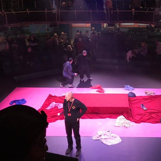 Stage play in large auditorium